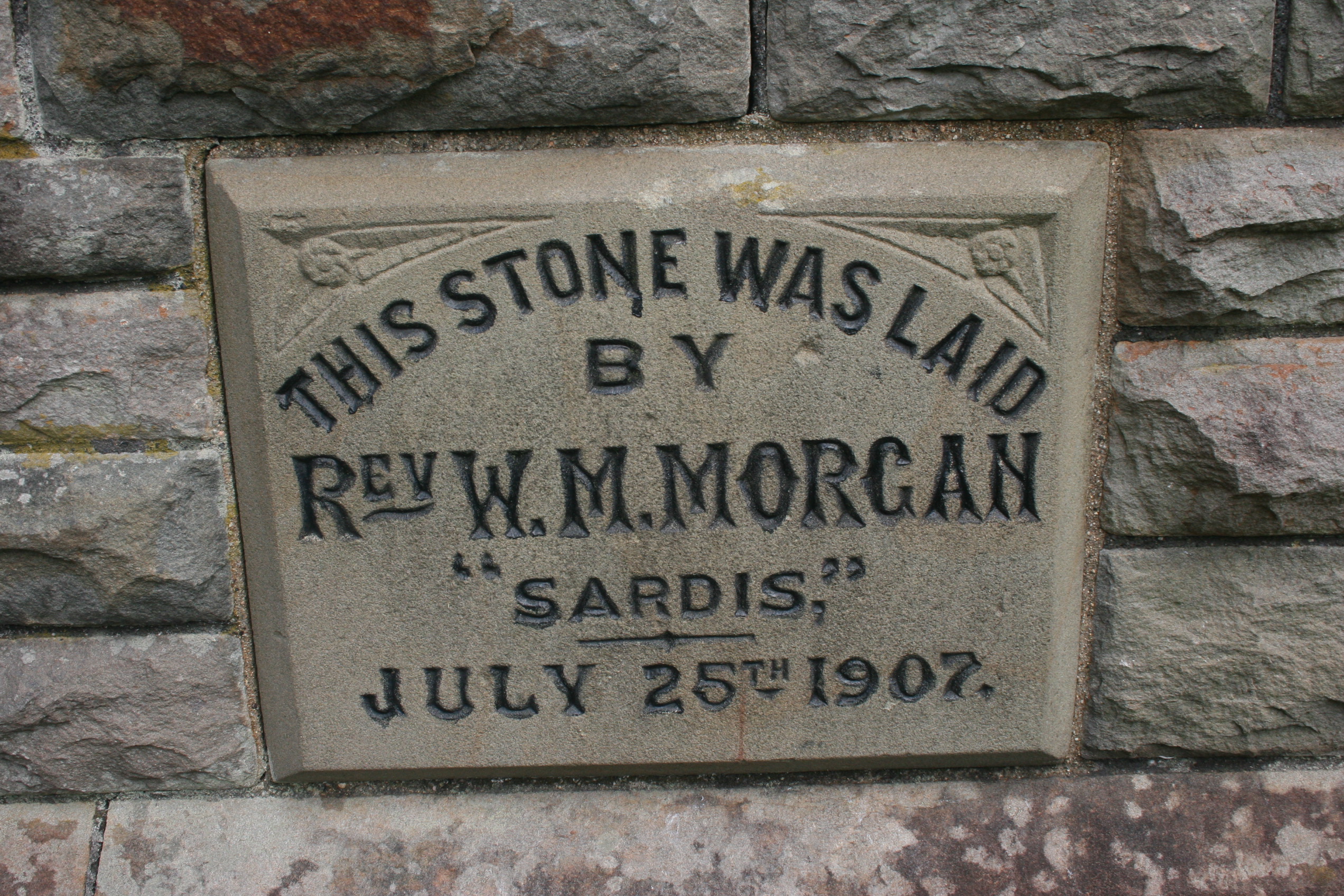 The foundation stone mentioning the Reverend of Sardis